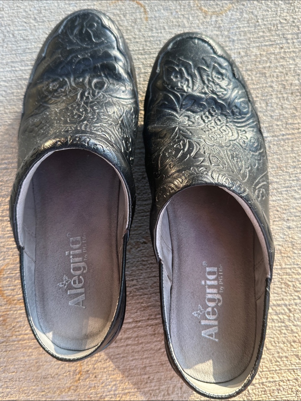 Alegria Black Embossed Leather Slip-On Clogs